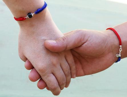 Bracciale Su Kokku rosso blu Caglari Poni e Go